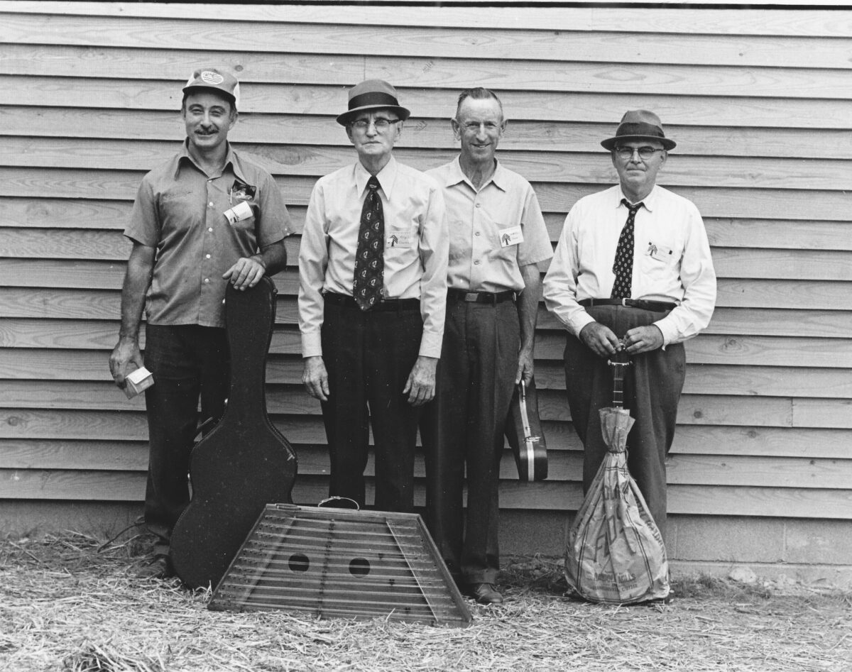 Fred Olson (Guitar), Virgil Craven (Hammered Dulcimer), Lauchlin Shaw (Fiddle), and Glenn Glass (Banjo)